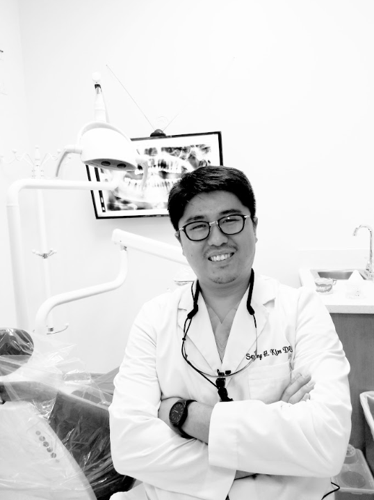 Dr. Kim smiling in the Prime Dental treatment room